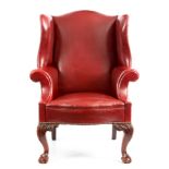 A MID 19th CENTURY GEORGE II STYLE MAHOGANY WING BACK ARMCHAIR with shaped back, sides and