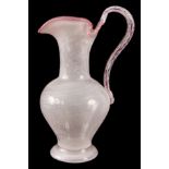 A STYLISH LATE 19TH CENTURY FRENCH GLASS EWER possibly by Baccarat or St. Louis, decorated with a