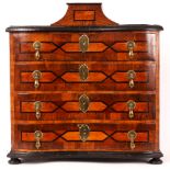 A MID 18TH CENTURY SOUTH GERMAN EBONY AND YEW-WOOD INLAID OAK MINIATURE SERPENTINE FRONTED CHEST