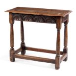 AN 18TH CENTURY JOINED OAK SIDE TABLE OF SMALL SIZE with moulded edge top above a three-quarter