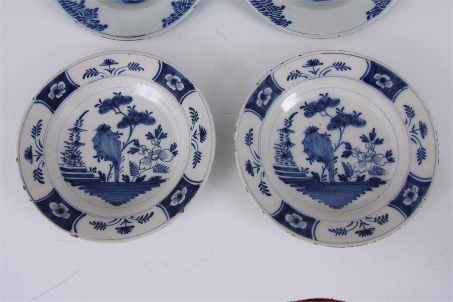TWO PAIRS OF 18TH CENTURY DUTCH DELFT PLATES with tree lined landscape centres and floral panelled - Image 3 of 6