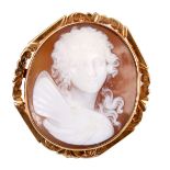 A GOLD MOUNTED CAMEO BROOCH portrait of an angel with engraved decoration to the mount 45mm long,