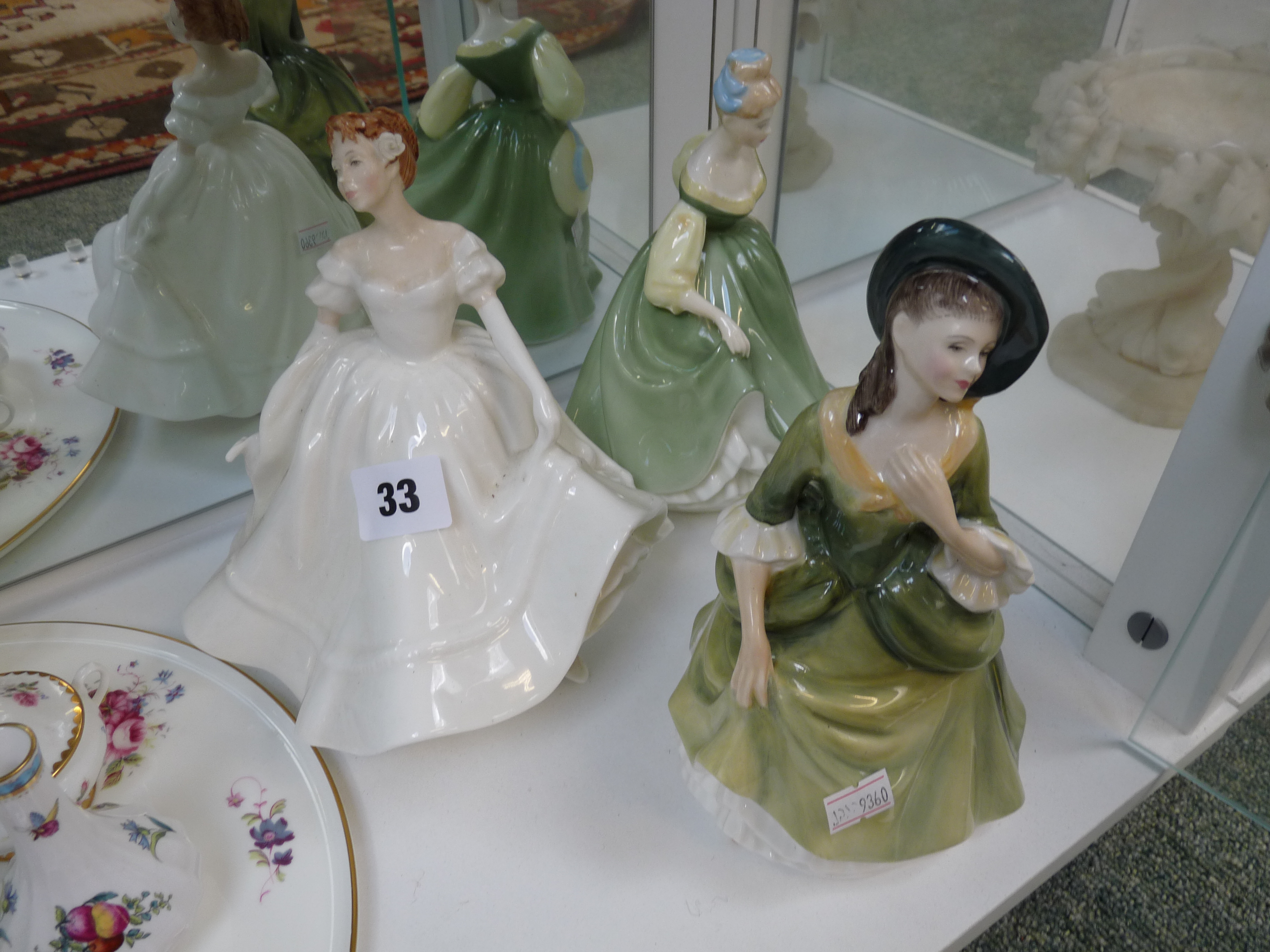 Royal Doulton 'Nancy' HN2955 figurine, 'Fair Lady' HN2193 & 'Sandra' HN2401, Condition - Cracking to