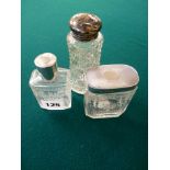 2 Silver topped scent and powder bottles with etched floral detail London 1930 and a Silver topped