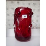 White friars Red knobbly glass vase with paper label to side, 22cm in height