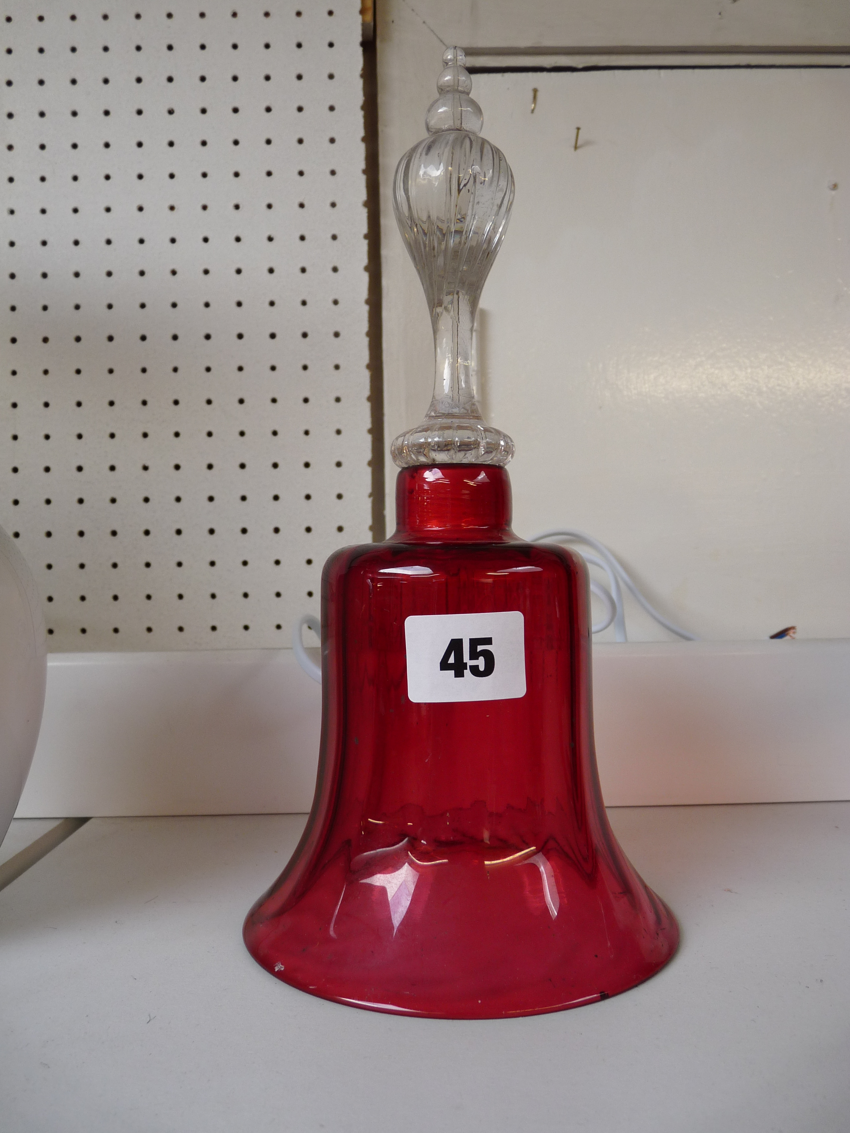 Edwardian Cranberry glass Bell with clear glass handle 26cm in height