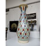 Iznic floral decorated vase of slender form, 30.5cm in height, Condition - chipping to top