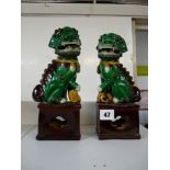 Pair of Late 19thC Chinese Famille Verte Buddhist lions, 25cm in height