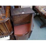 Early 19thC Oak cased apothecary chest with Brass handle over hinged door containing 26 Drawers with