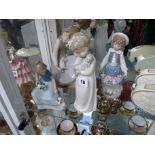 4 Nao figures in Girl with puppies, Girl with doll, Flower Girl and girl with Dove