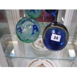 Caithness Dolphinarium pattern paperweight and another unmarked paperweight 12cm in diameter