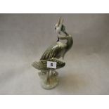 Royal Dux figure of a Heron in standing position eating a fish, gloss finish, marked lozenge to base