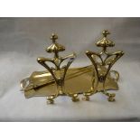 Pair of Art Nouveau Brass Fire Dogs, similar two handled tray and a 2 Piece Brass companion set