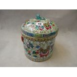 Heavy Chinese Famille Rose Alter pot with butterfly decoration and surmounted dog of foe handle,