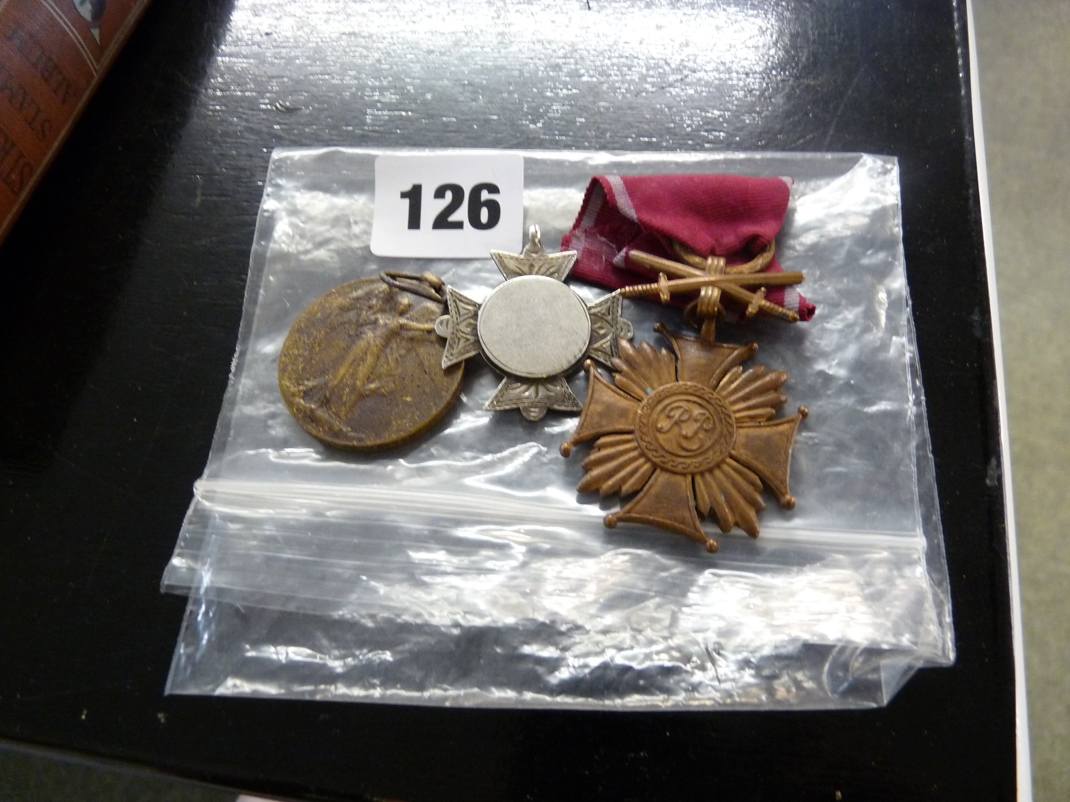 Polish Order of Merit, WW1 Brass medal and a Silver Cross Pendant