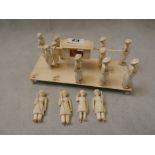 19thC Chinese Ivory carving of a deity in hand carried wagon comprising of 14 pole bearers,