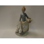 Lladro Figure of a Girl with Geese, blue mark to base stamped 2010, 24cm in Height