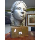 Large painted bust of a young woman by Annette Brown 1970 on wooden plinth