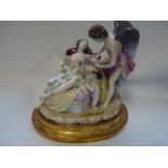 Meissen 19thC European Hard paste figure of recumbent woman on chaise with angel and cherub, Blue