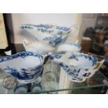 Collection of 18thC Blue & White Bow sauce boats in c Pylon trees pattern and a Polychrome Sauceboat