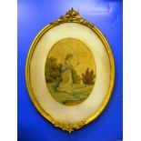 A pair of 19th century oval silk pictures of girl skipping and boy with hoop in gilt frames