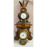 A Victorian carved walnut clock, barometer, thermometer with day and month rolls