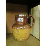 A Doulton harvest ware jug with silver rim (s/a/f)