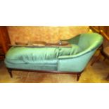 A chaise longue with loose cushion