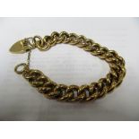 A 9ct gold link bracelet with padlock clasp