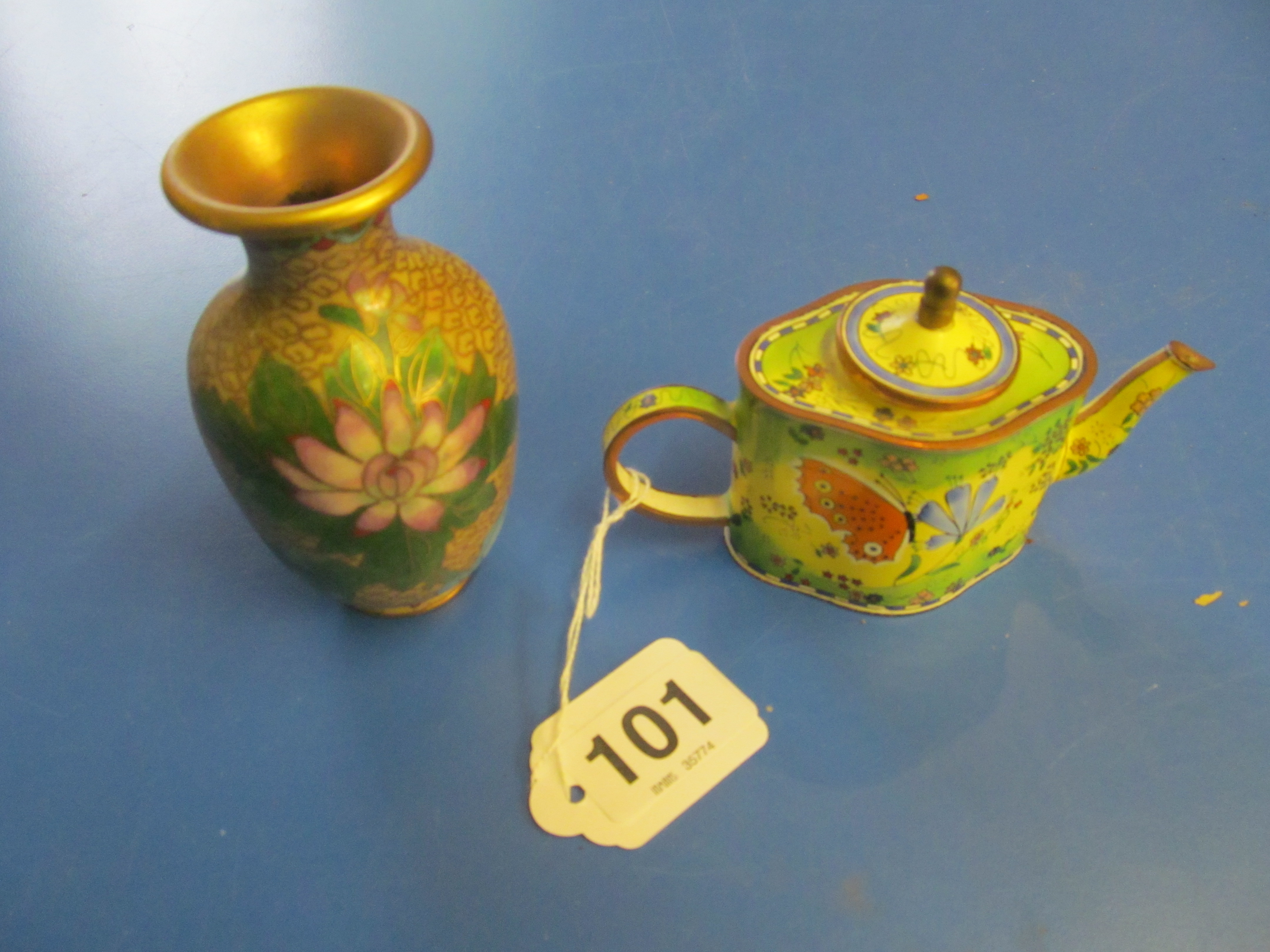 A cloisonné miniature teapot and a vase