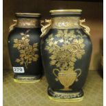 A pair of Noritake vases black and gilt floral design