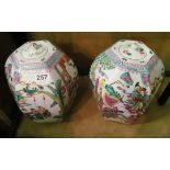 A pair of Famille Rose lidded vases decorated geisha in garden settings