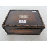 A cigar box with cigars