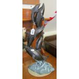 A Dolphin metal sculpture.