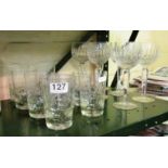 A set of six tall wine glasses and other glasses