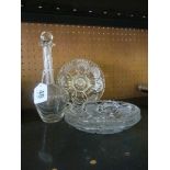 Three crystal side plates and vinaigrette decanter.