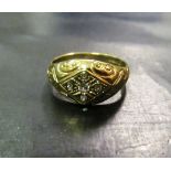 A 9ct gold gypsy set diamond ring