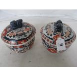 A pair Imari style lidded jars