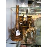 Two eastern brass vases, three brass stag ornaments and a brass pestle and mortar