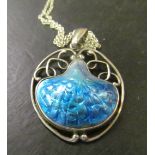 An Art Nouveau silver and blue enamel pendant