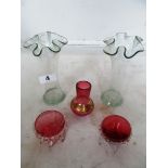 Some Victorian cranberry glass dishes and two Victorian glass fluted vases