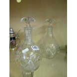 A pair of decanters.