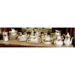 A Royal Albert Country Roses dinner and teaset.