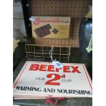 A Bourneville advertising basket and various Beefex advertising signs