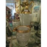 A glass and gilt jug and ice cooler.