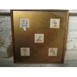 A framed picture of five cherubs and print three cherubs