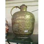 A large brass jug.