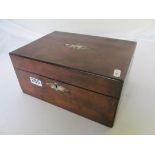 A walnut sewing box