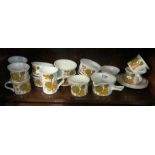 A Midwinter part teaset, white and orange flowers.