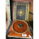 A Victorian blotter with pietra dura plaque, another in brass and a woolwork stand.